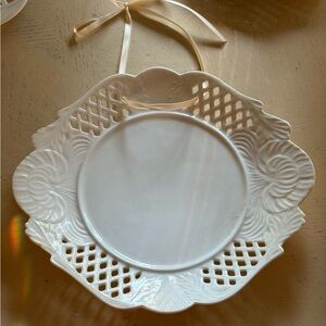 white porcelain oval plate with a lattice design by "Home Essential” 10”